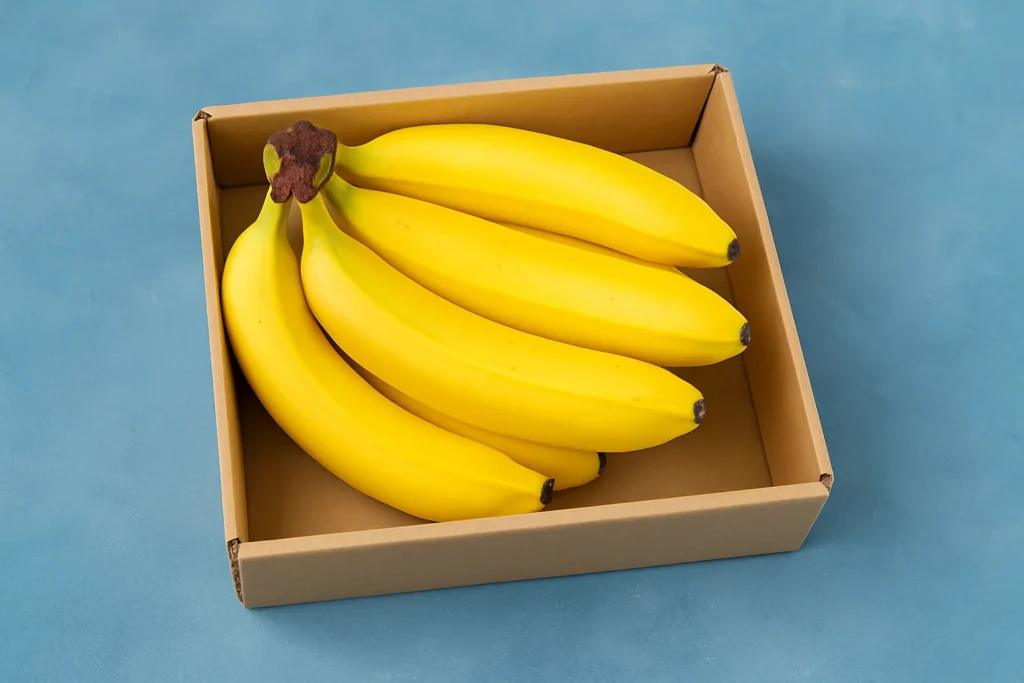 Fresh bananas on a wooden table showing the benefits of bananas for energy and digestion